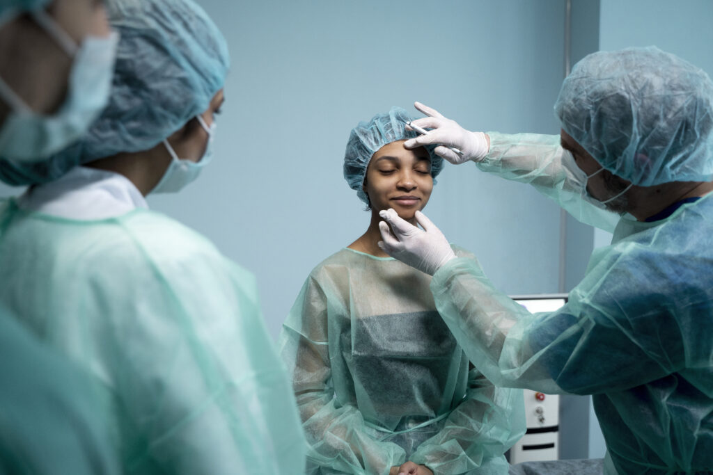 doctor-checking-smiley-patient-before-surgery